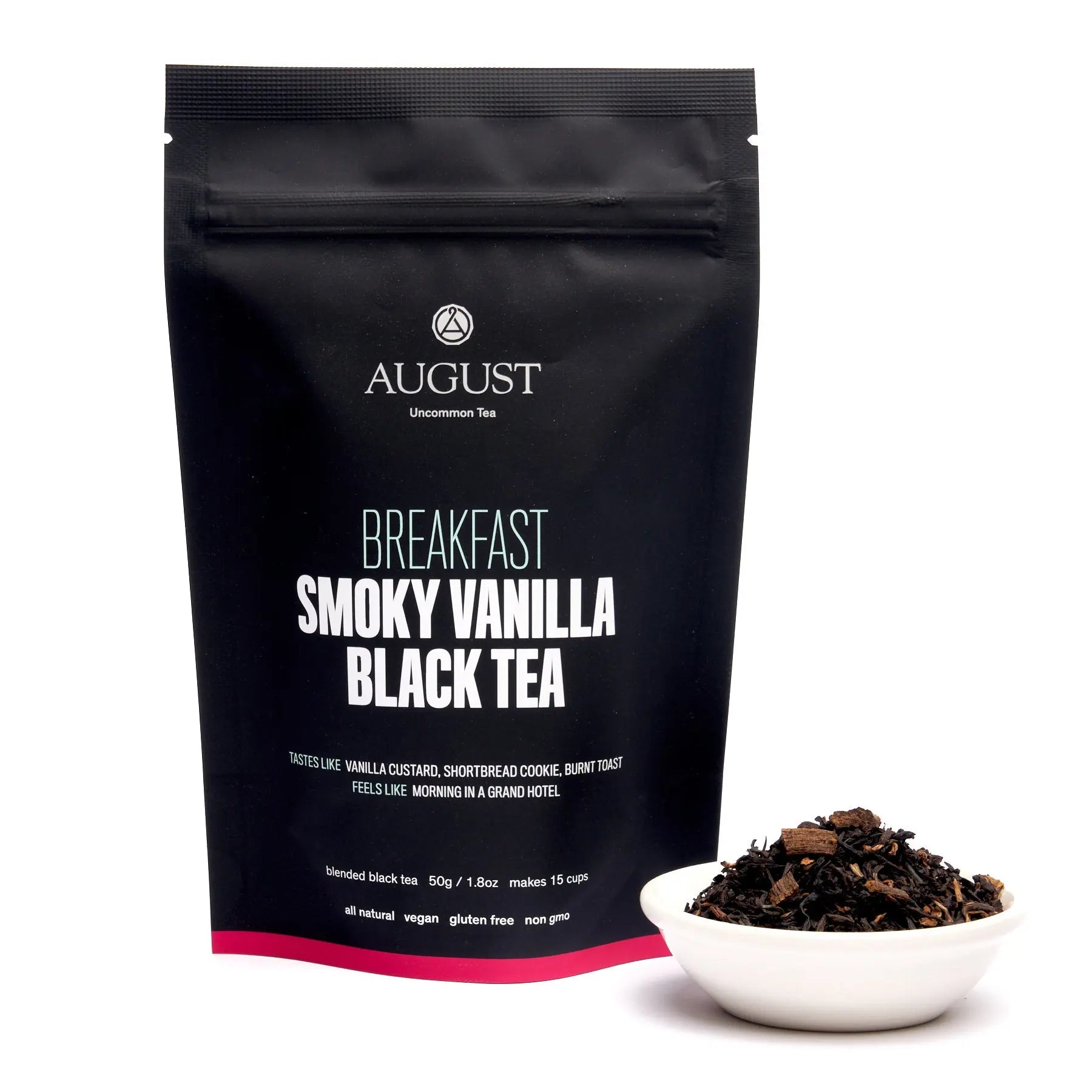 August Uncommon Tea smoky vanilla black tea in a 15-cup bag, ready for brewing, with dark tea leaves and vanilla flavor hints.