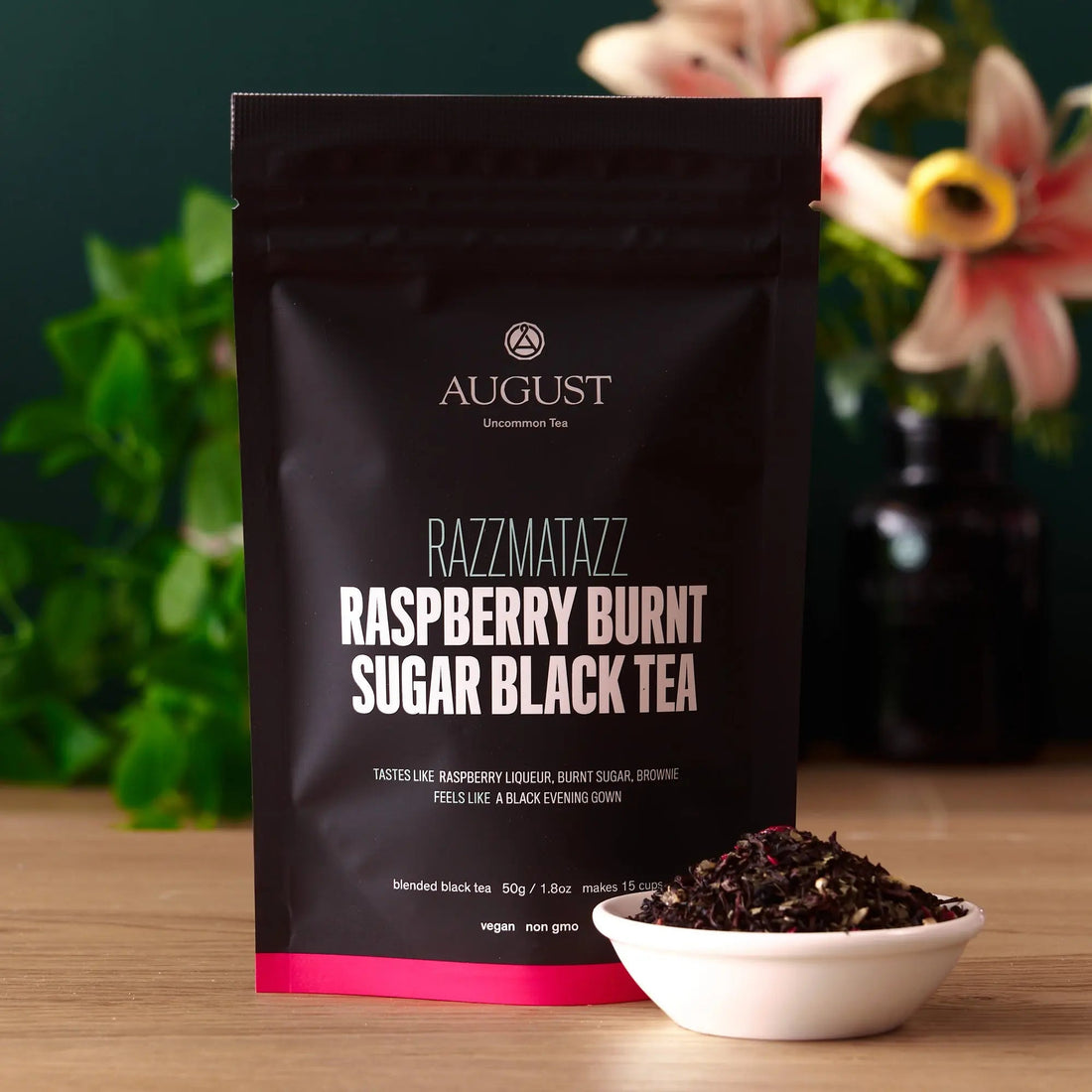 Raspberry Burnt Sugar Black Tea bag from August Uncommon Tea, showcasing the packaging for Razzmatazz black tea.