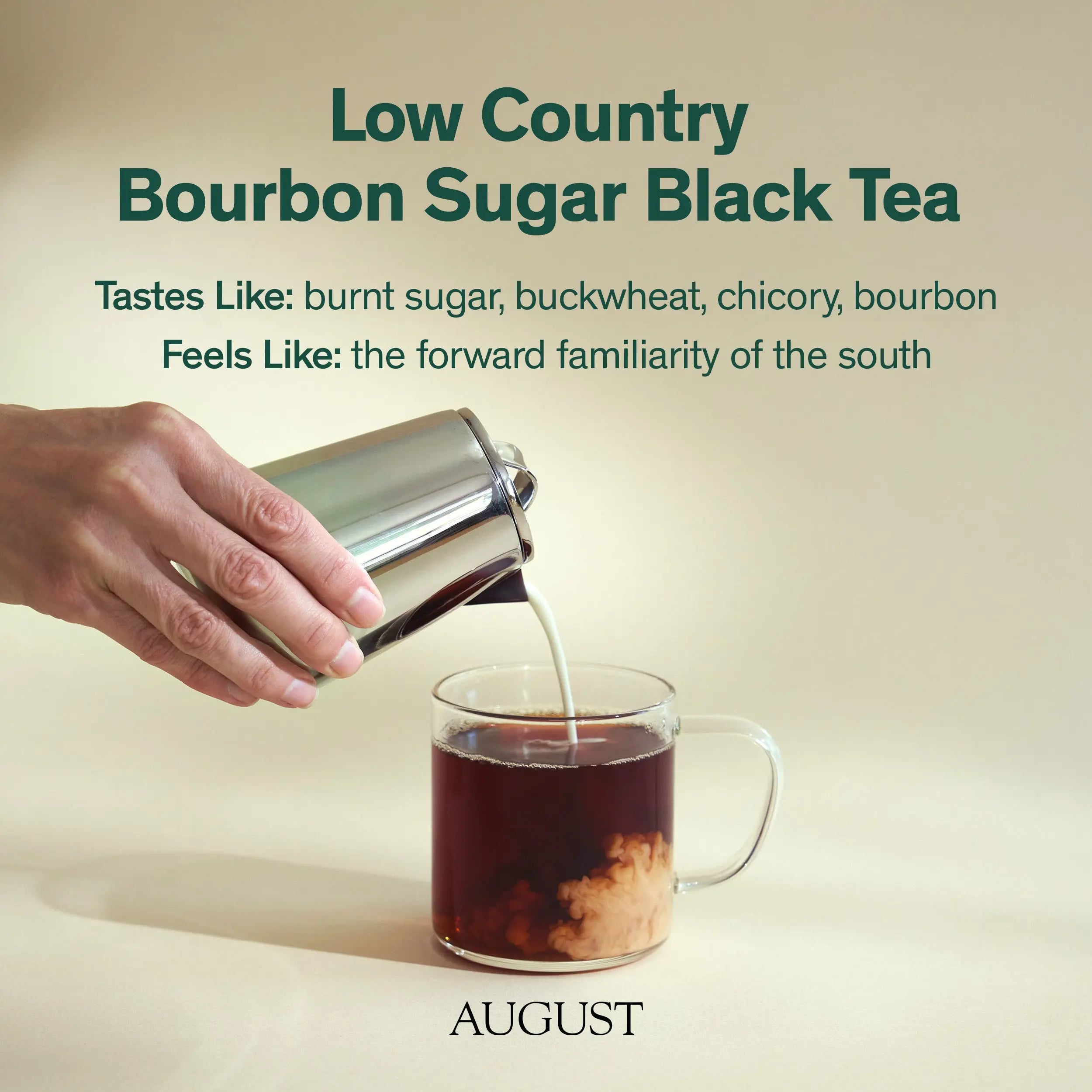 Black tea from August Uncommon Tea, Low Country Bourbon Sugar Black Tea, in a clear glass cup with dark amber liquid and tea leaves visible.