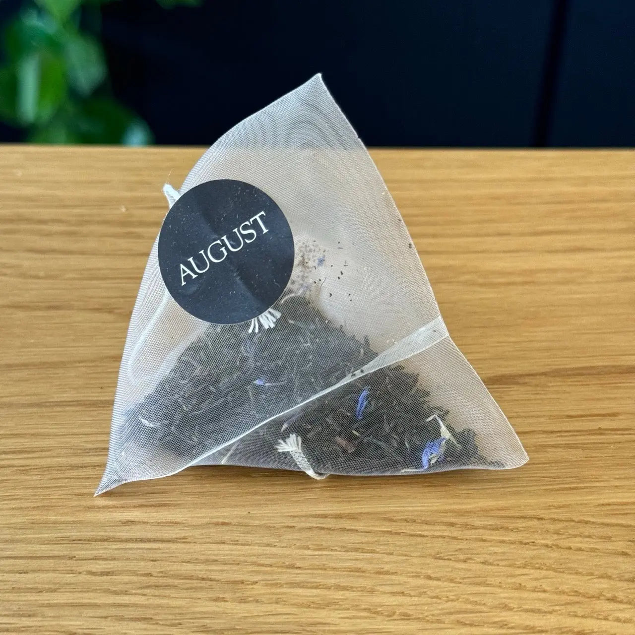 August Uncommon Tea Essentials Earl Grey Black Tea in 15 tea bags, showcasing the elegant packaging and tea bags inside.