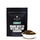 Four cups of Combray Vanilla Cardamom Green Tea from August Uncommon Tea, showcasing a vibrant green tea beverage in clear cups.
