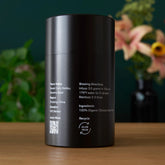 Single estate Pi Lo Chun green tea from Rare Leaves Emerald by August Uncommon Tea, featuring fresh green tea leaves in a tin container.