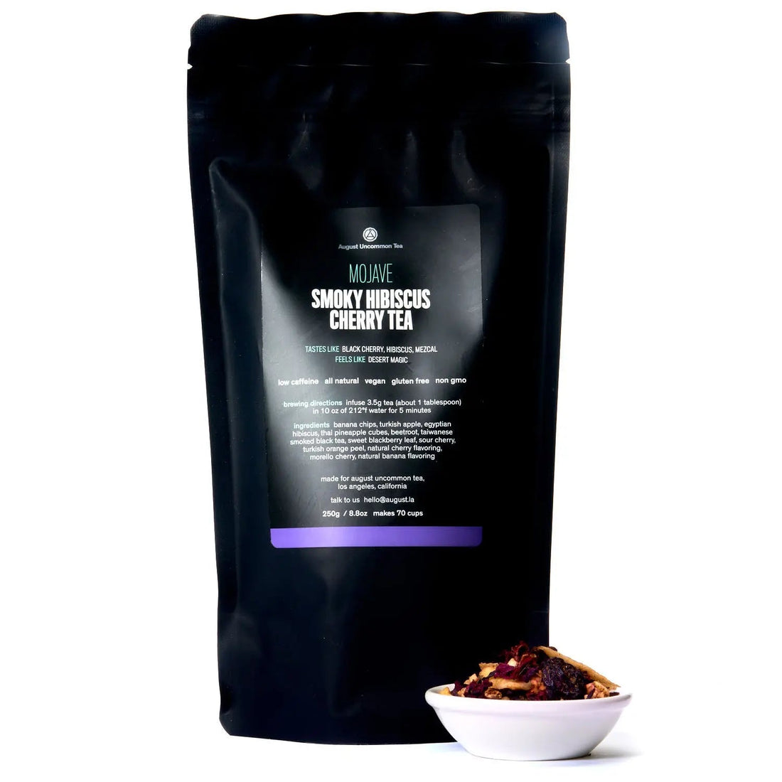 Mojave Smoky Hibiscus Cherry Tea by August Uncommon Tea in a 70-cup herbal tea bag, showcasing dried hibiscus and cherry ingredients.