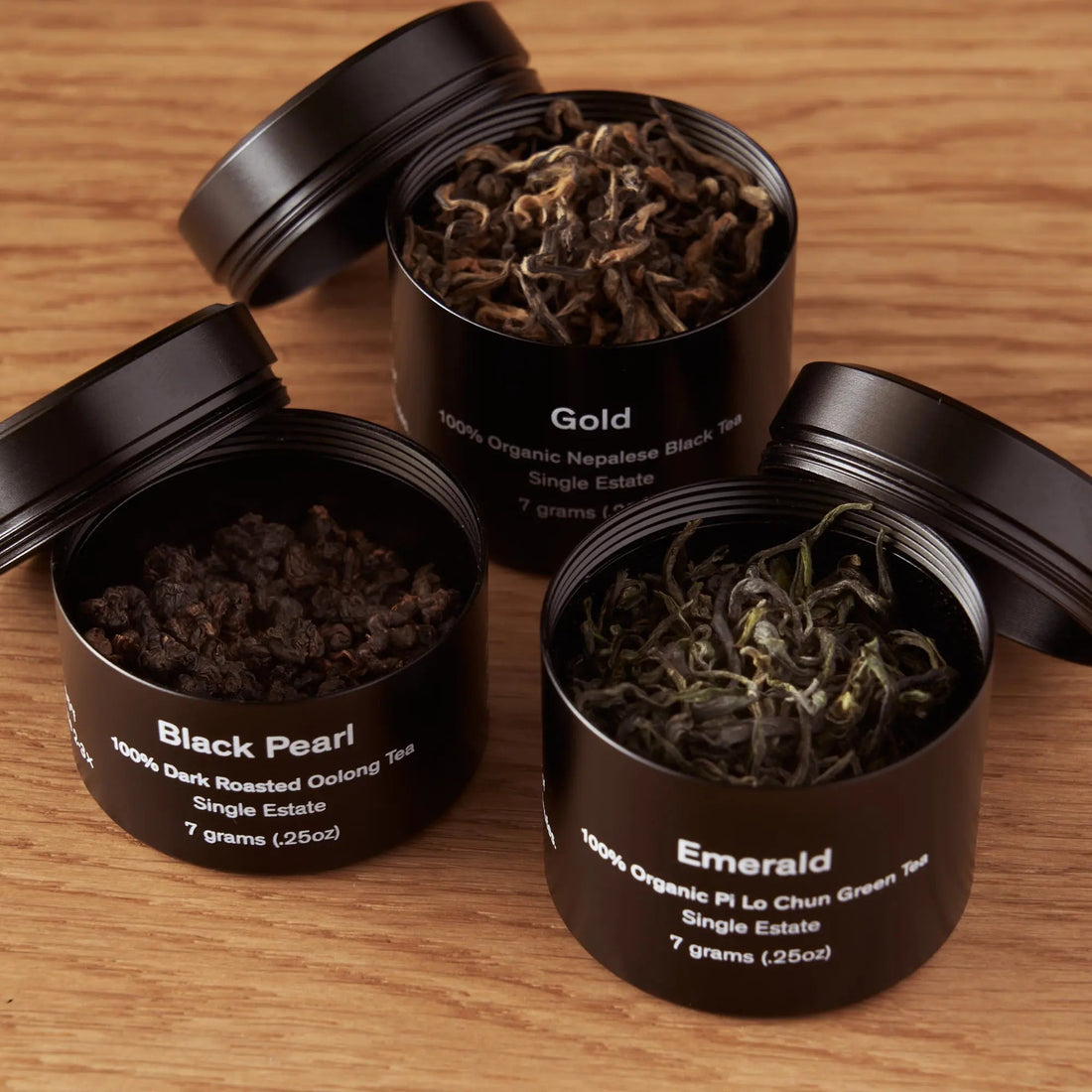 August Uncommon Tea Rare Leaves single origin tea sampler mini tin featuring assorted open straight teas in a compact tin.