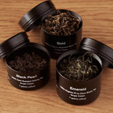 August Uncommon Tea Rare Leaves single origin tea sampler mini tin featuring assorted open straight teas in a compact tin.
