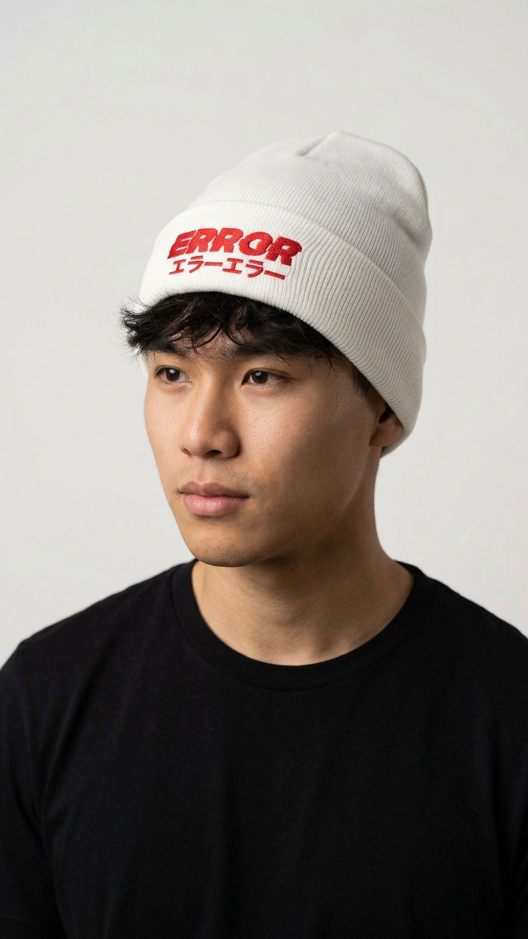 Yūjin Clothing Error Beanie, stylish black headwear with bold white error design, perfect for casual winter wear.