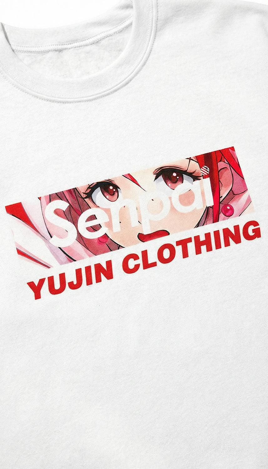 Yūjin Clothing Senpai Sweatshirt featuring a comfortable fit and stylish design, shown in a close-up of the soft fabric and logo.