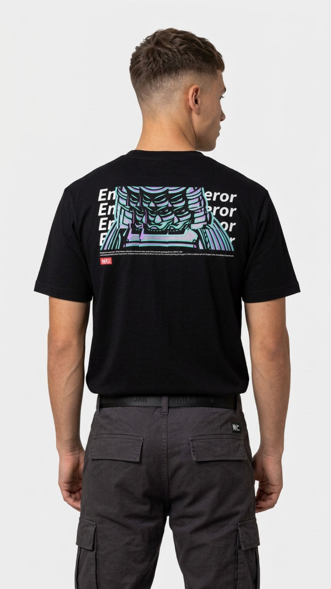 Yūjin Clothing Emperor T-Shirt featuring a bold graphic design on soft fabric, styled with casual jeans for a modern look.
