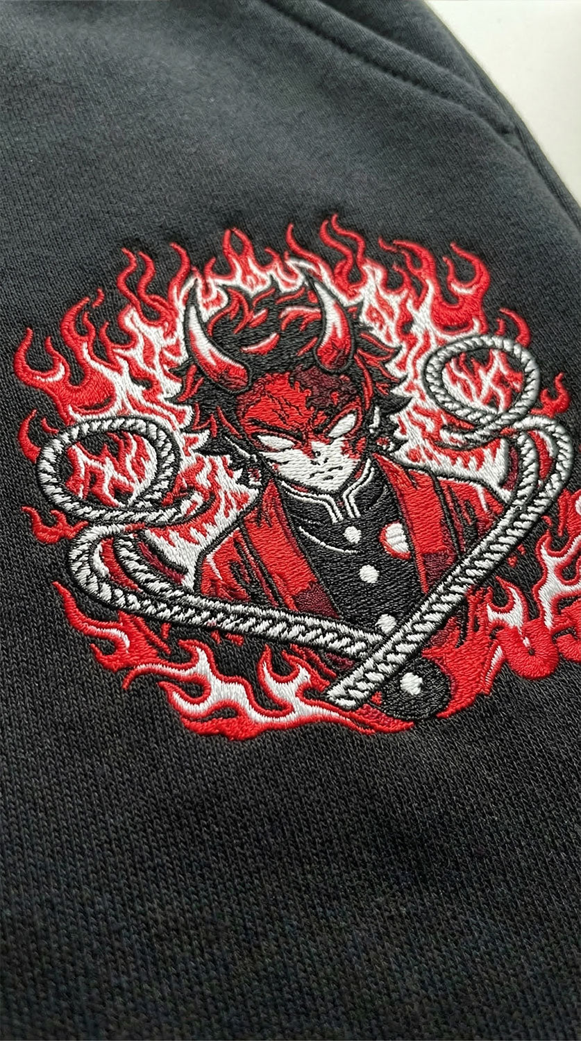 Yūjin Clothing Fire God sweatpants featuring bold flame graphic design and comfortable fit, ideal for casual wear and street style.
