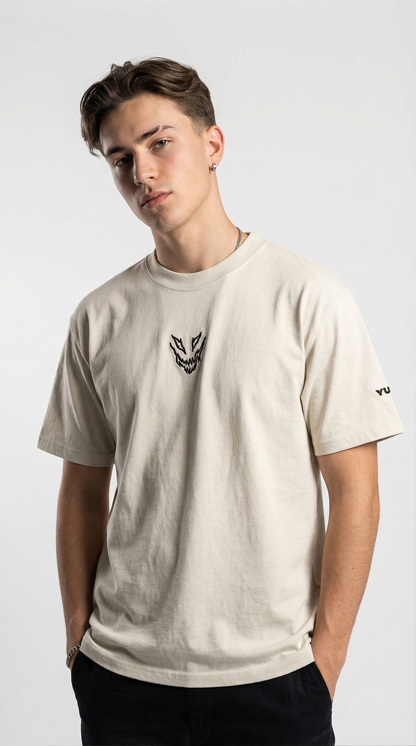Yūjin Clothing Mad Oversized Faded T-Shirt displayed on a hanger, showcasing its relaxed fit and stylish faded design.