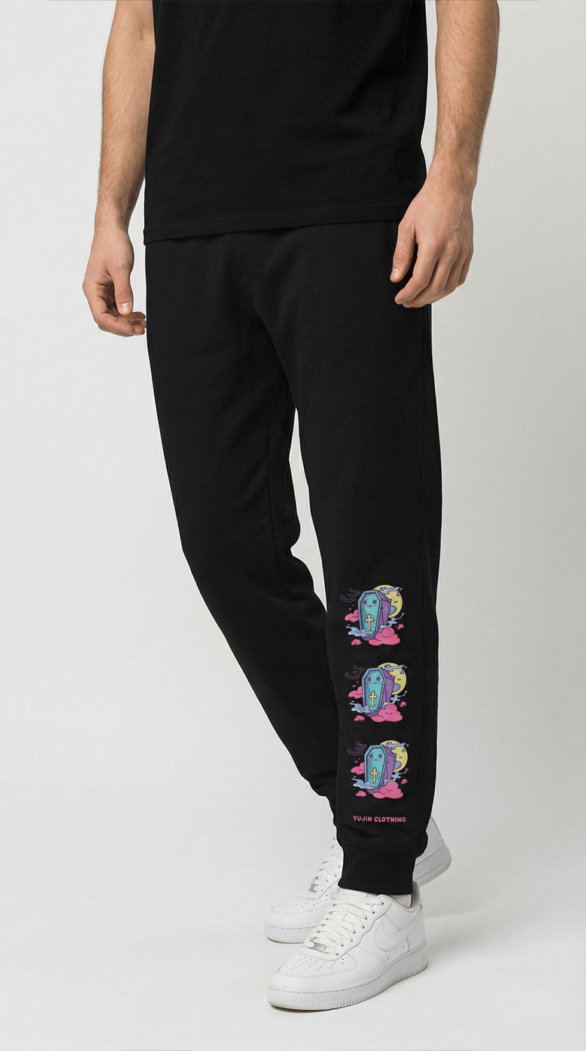 Yūjin Clothing Happy Life sweatpants laid flat, showing comfortable fit and soft fabric in a relaxed casual style.