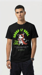Yūjin Clothing Creep It Real cat T-shirt featuring a spooky cat graphic on a black cotton shirt.