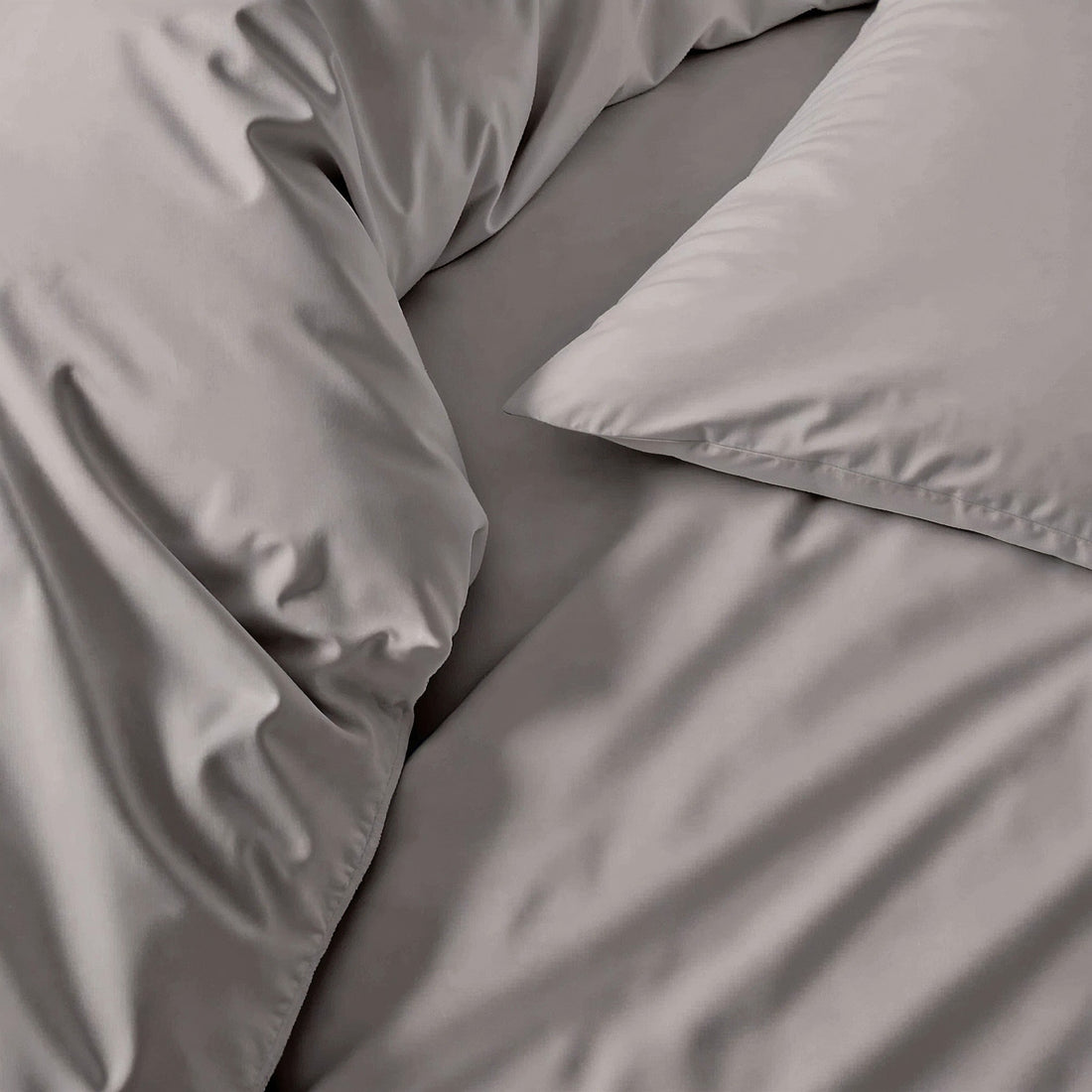 Luxury Australian sateen pillowcase set by Italic, soft and smooth bed pillowcases shown in a cozy bedroom setting.