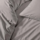 Luxury Australian sateen pillowcase set by Italic, soft and smooth bed pillowcases shown in a cozy bedroom setting.