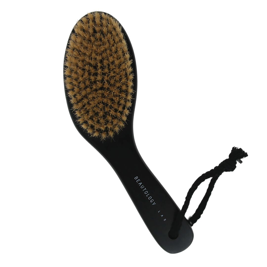 BEAUTOLOGY LAB Lymphatic Dry Brush with natural bristles for exfoliating and stimulating lymphatic drainage on skin.
