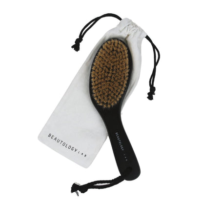 BEAUTOLOGY LAB lymphatic dry brush with wooden handle and natural bristles for gentle skin exfoliation and lymphatic drainage.