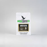 Ground Birdie Coffee Company Bunker Blend Latin American coffee in a bag, showcasing rich roasted coffee grounds.