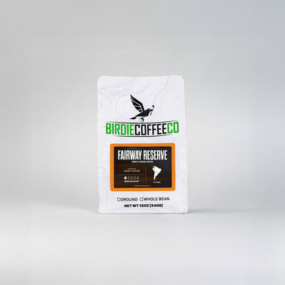 Birdie Coffee Company Fairway Reserve Colombia Coffee in a bag with fresh roasted beans visible and a golf-themed label.