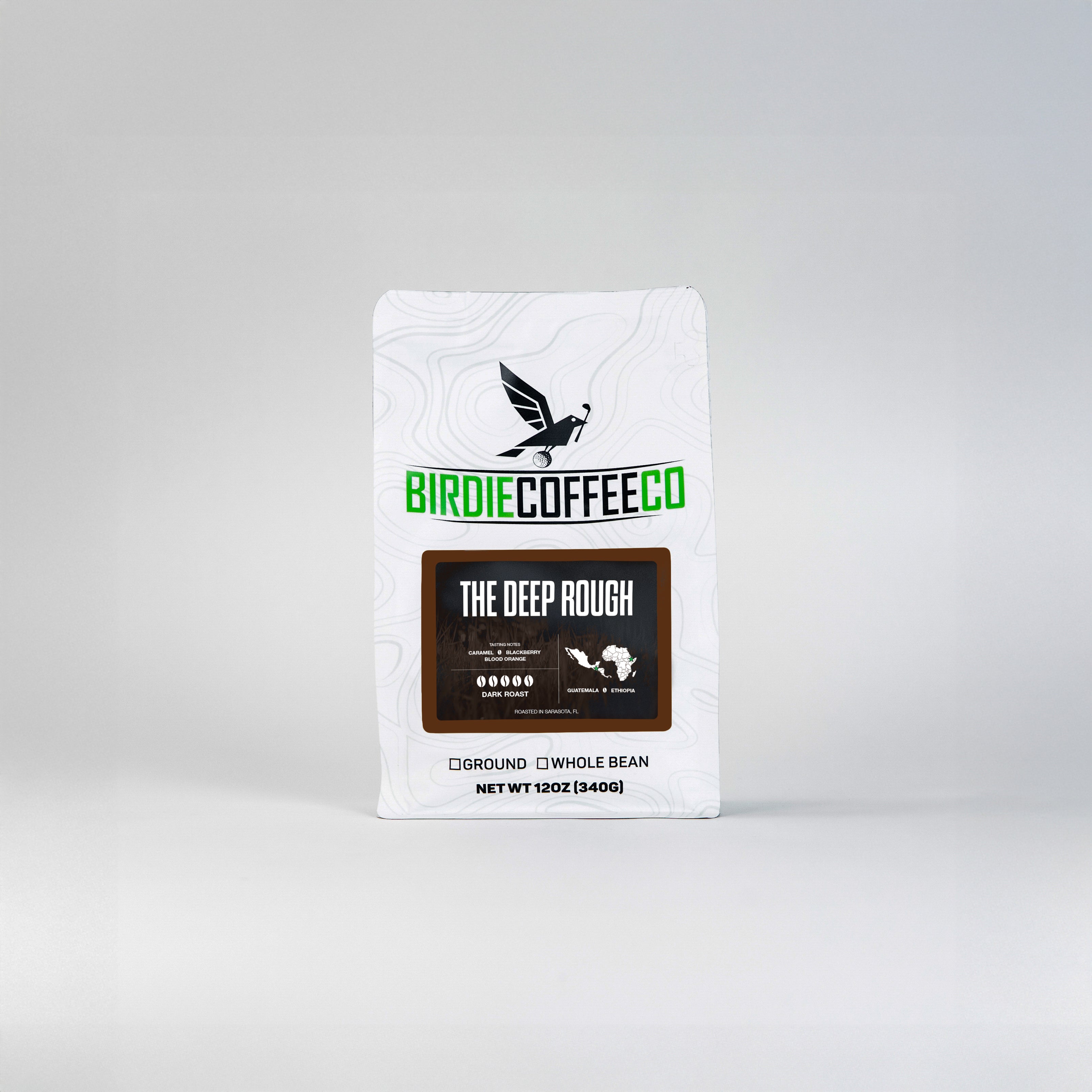 Dark roast coffee in a bag from Birdie Coffee Company, featuring The Deep Rough blend with rich, bold coffee beans.