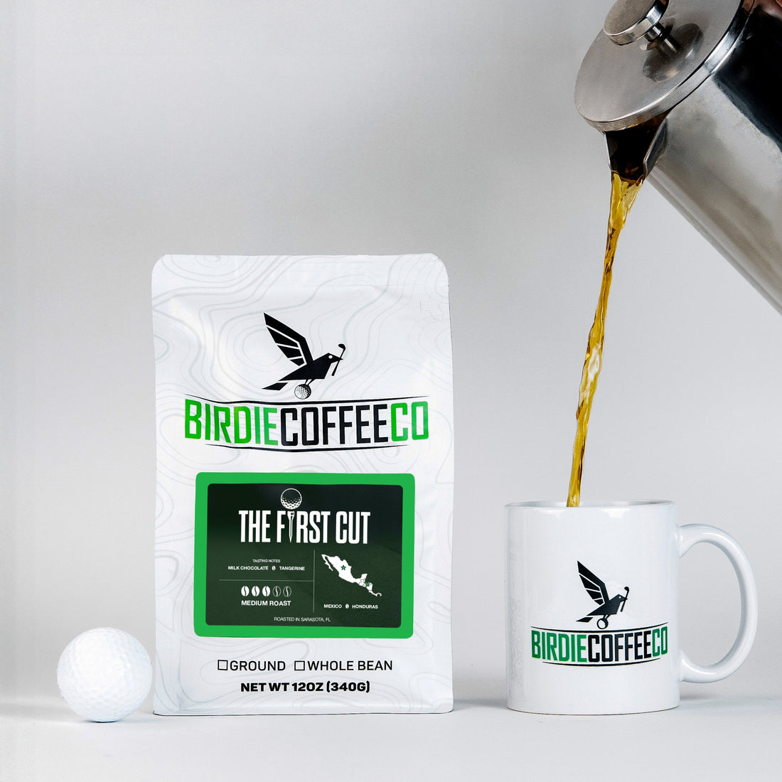 Ground Birdie Coffee Company The First Cut Medium Roast Coffee in a clear bag, showcasing its rich, aromatic coffee grounds.