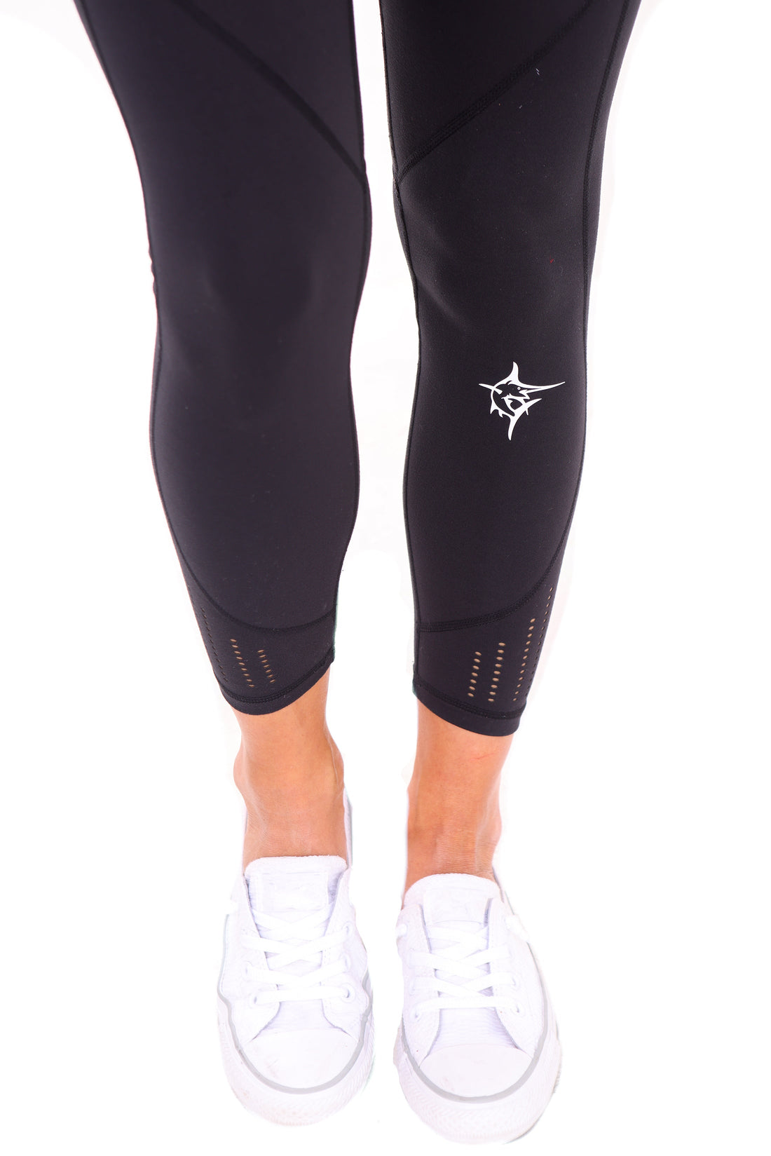 White Water Life HydroFlex Cut Out Leggings shown on a model, featuring a sleek black design with cut-out details for active wear.