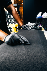 Blackline Pet Hair Brush from Blackline Car Care with ergonomic handle and bristles for removing pet hair from upholstery.