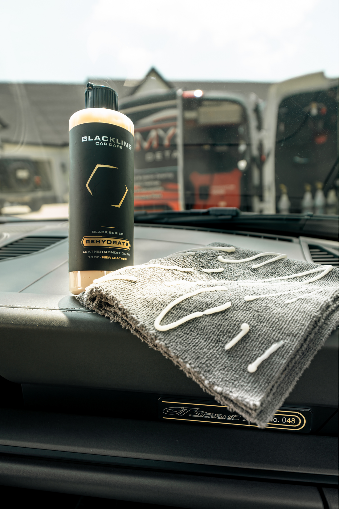 Blackline Car Care BLACKLINE® Rehydrate Leather Conditioner bottle showing label and applicator tip for leather care.