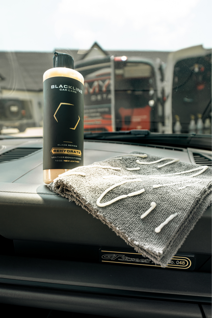 Blackline Car Care BLACKLINE® Rehydrate Leather Conditioner bottle showing label and applicator tip for leather care.
