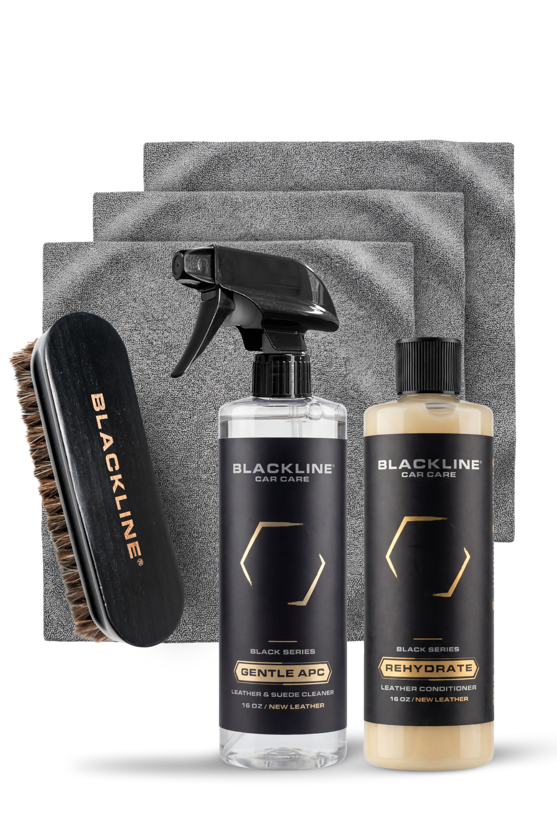 Blackline Car Care BLACKLINE® Rehydrate Leather Conditioner applied with a leather brush, restoring and conditioning vehicle leather surfaces.