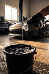 Blackline Car Care BLACKLINE® Restore microfiber detergent bottle with label for cleaning microfiber car accessories.