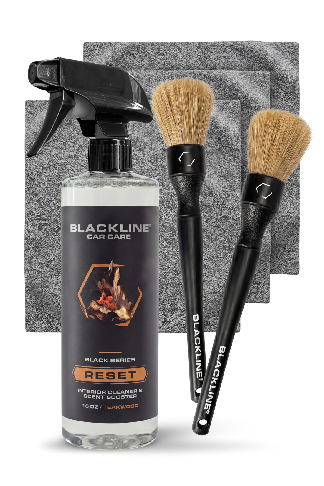 Blackline Car Care BLACKLINE® Reset Interior Cleaner and Scent Booster with teakwood scent in a bottle.