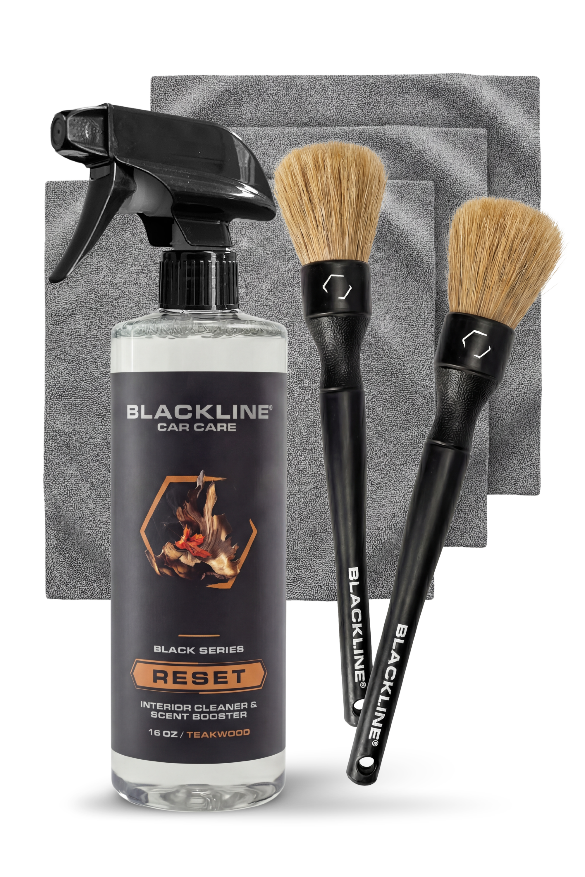Blackline Car Care BLACKLINE® Reset Interior Cleaner and Scent Booster with teakwood scent in a bottle.