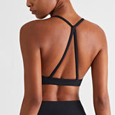 Blackout Barbell Aria Bra featuring soft fabric, supportive design, and adjustable straps for comfortable fit.