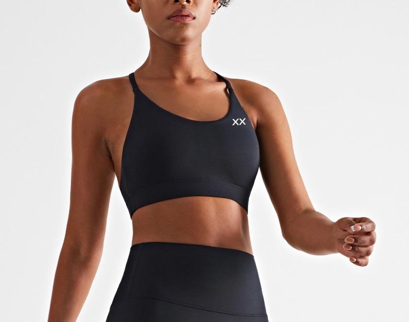 Blackout Barbell Aria Bra with supportive design and adjustable straps, featuring soft fabric and stylish detailing.