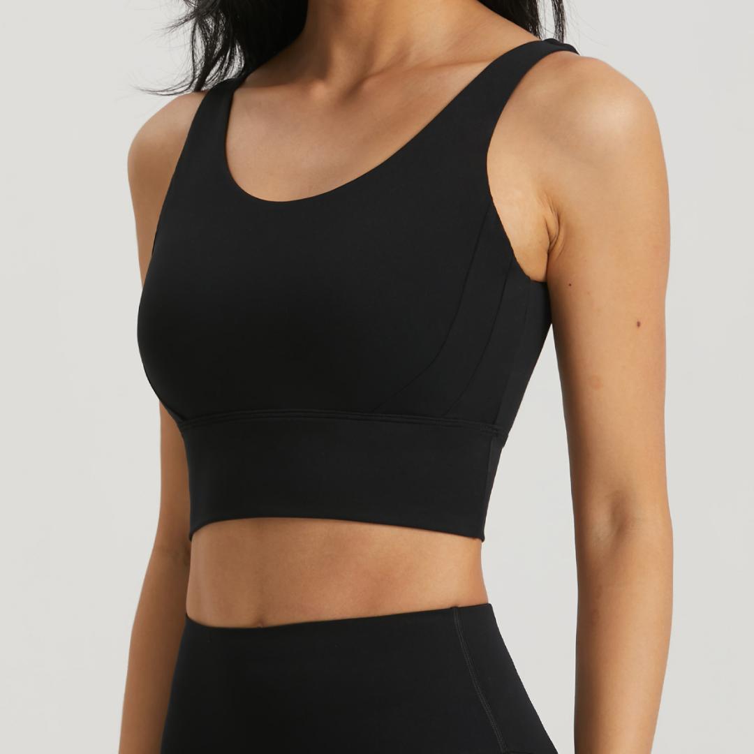 Black Omni Bra by BLACKOUT BARBELL in black color, featuring supportive straps and a sleek, comfortable fit.