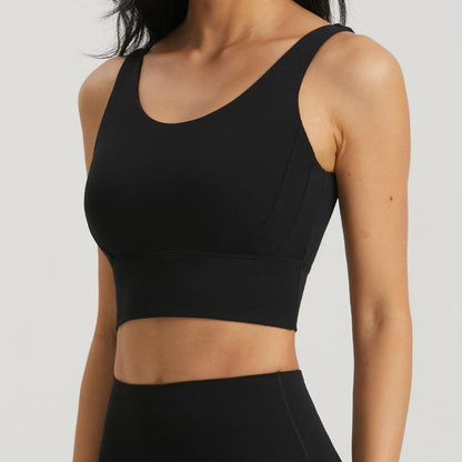Black Omni Bra by BLACKOUT BARBELL in black color, featuring supportive straps and a sleek, comfortable fit.