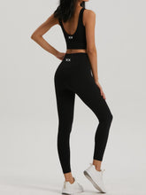 Black BLACKOUT BARBELL Omni Bra in black, featuring comfortable fabric and supportive design for everyday wear.