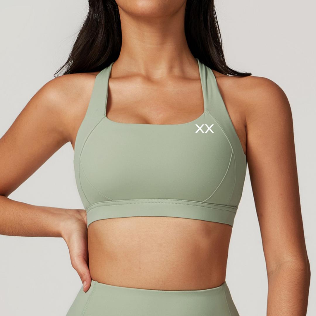 Blackout Barbell Haven Bra displayed on a model, featuring comfortable fabric and supportive design for everyday wear.
