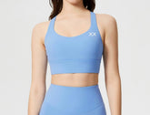 BLACKOUT BARBELL Ryla bra with supportive design and adjustable straps, displayed on a neutral background.
