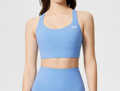 BLACKOUT BARBELL Ryla bra with supportive design and adjustable straps, displayed on a neutral background.