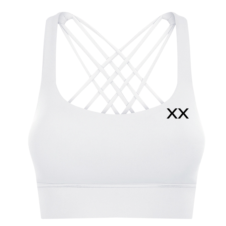 White Ryla Bra by BLACKOUT BARBELL featuring sleek design and supportive fit, displayed on a neutral background.