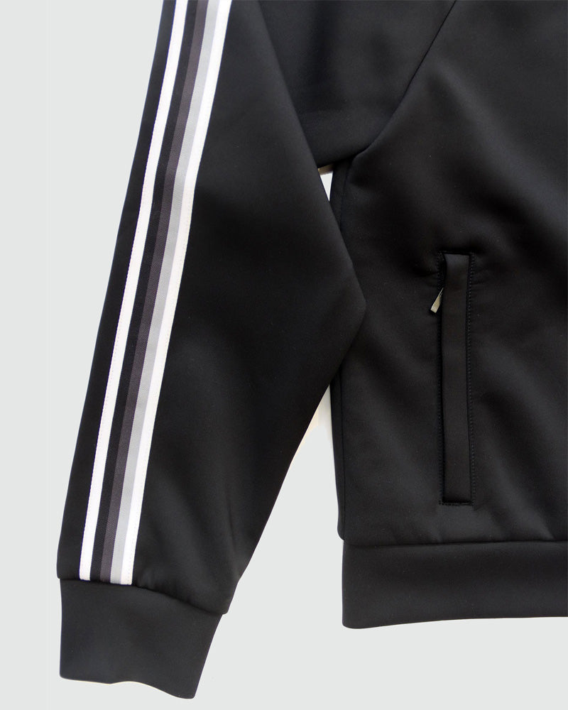 Goal Five Powerstripe LS Track Jacket in black, featuring a sleek lifestyle design with stripe details and athletic fit.