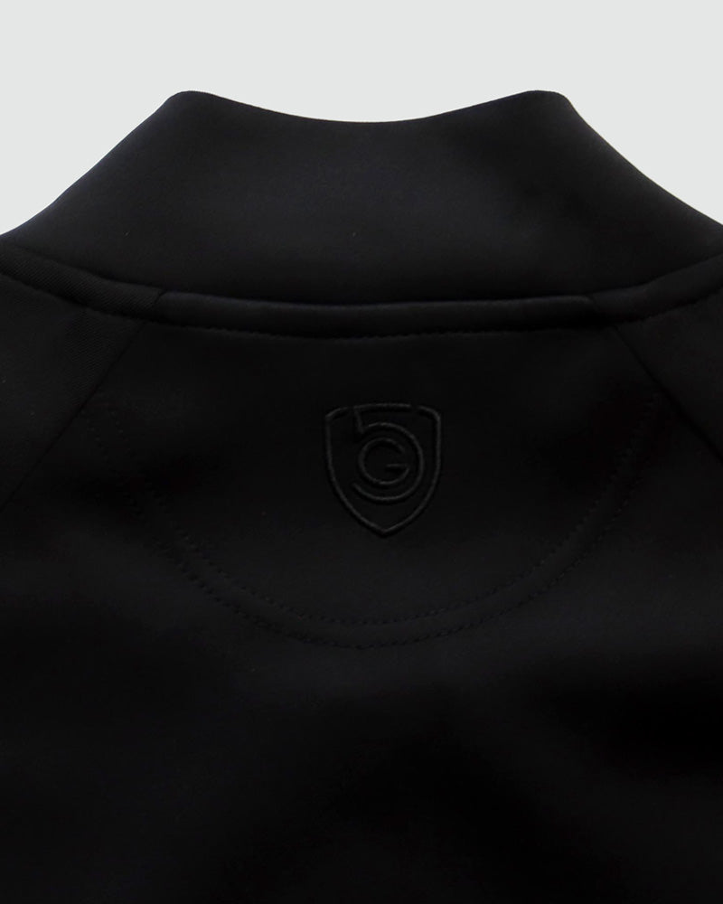 Goal Five Powerstripe LS Track Jacket in black, lifestyle image showing sporty design with striped details and athletic fit.