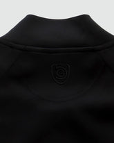 Goal Five Powerstripe LS Track Jacket in black, lifestyle image showing sporty design with striped details and athletic fit.
