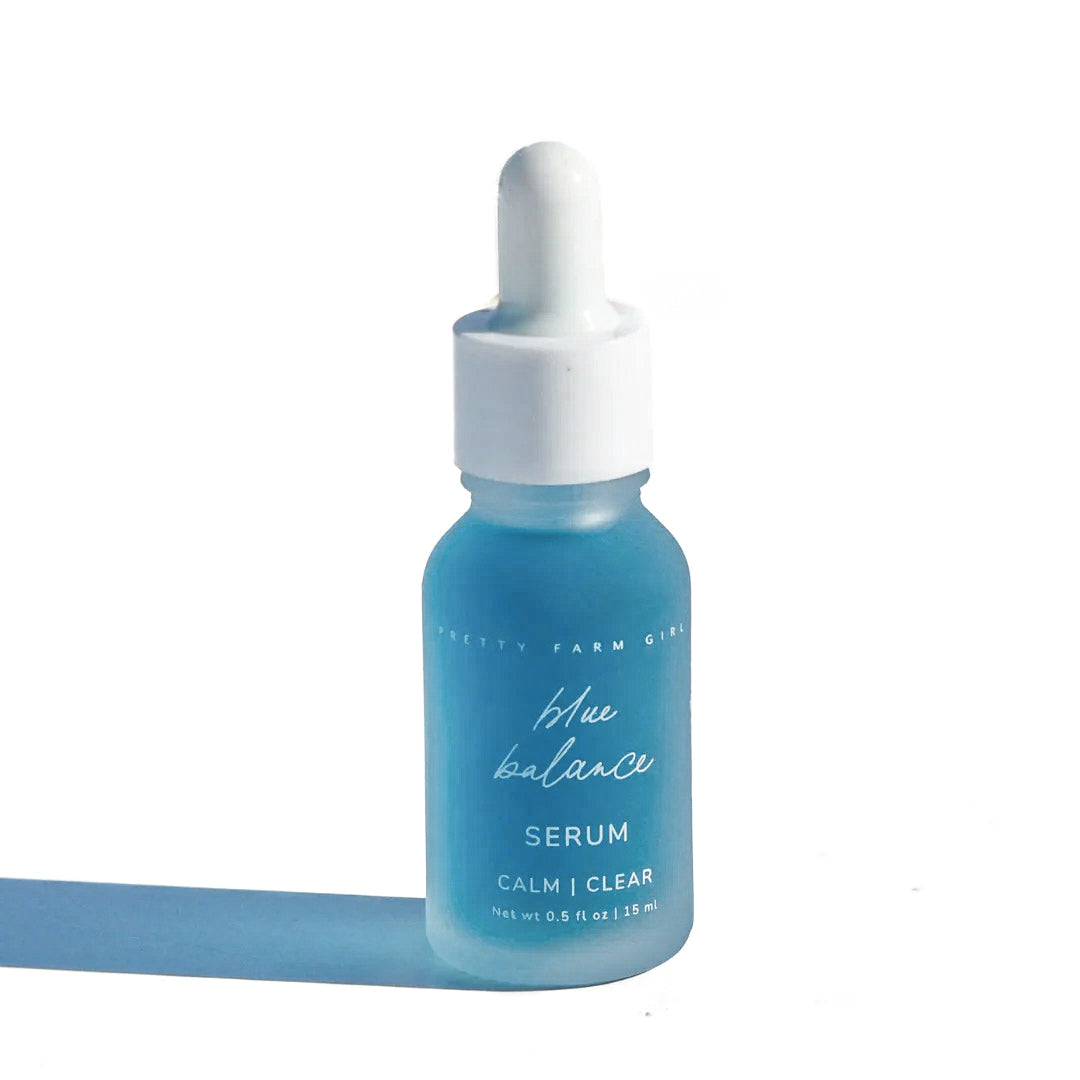 Pretty Farm Girl Blue Balance Face Serum bottle with blue packaging, showcasing a skincare product for balanced, radiant skin.
