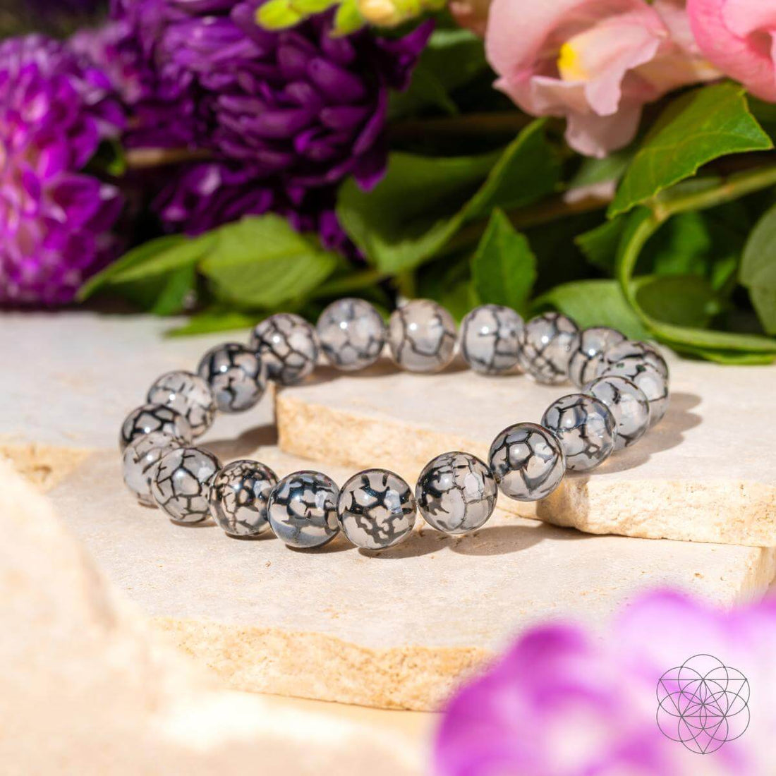 River agate bracelet from Conscious Items, featuring smooth, polished stones with calming natural patterns.