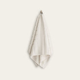 Italic Capri Australian Cotton Hand Towel, soft and absorbent home bath towel in neutral color, showcasing textured fabric and stitching.