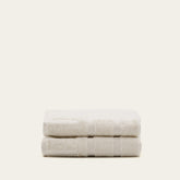 White Capri Australian Cotton bath towel from Italic with soft, plush texture, displayed folded on a clean bathroom surface.