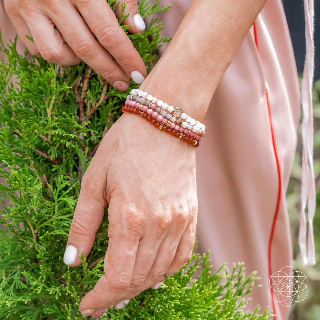 Set of four Conscious Items jewelry bracelets featuring change and transformation themes, with varied designs and colors.