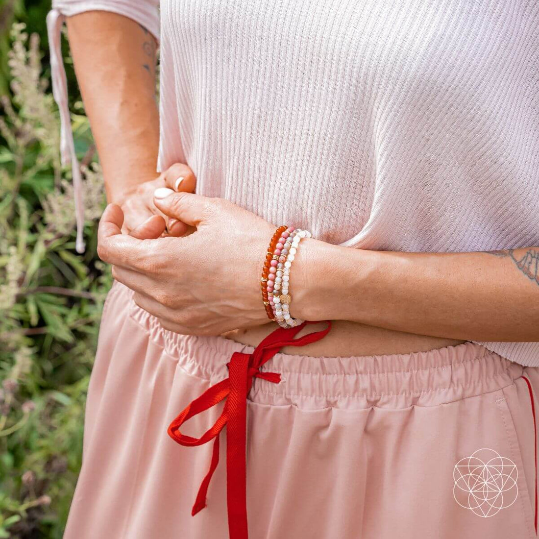 Set of four jewelry bracelets by Conscious Items featuring change and transformation-themed designs.